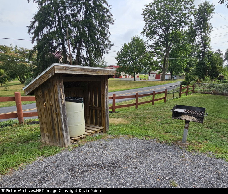 Trash shed & charcoal grill